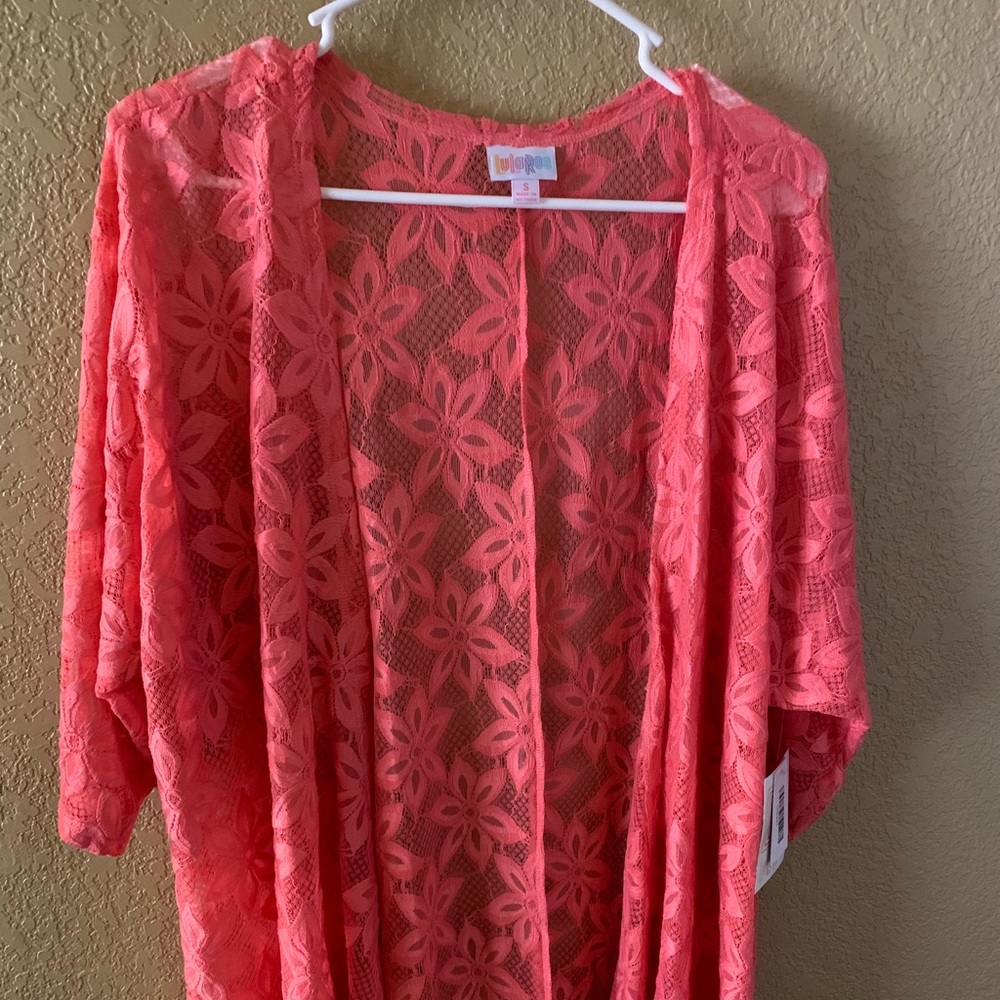 NWT.....Lularoe Lindsay cover. Size small. Coral.